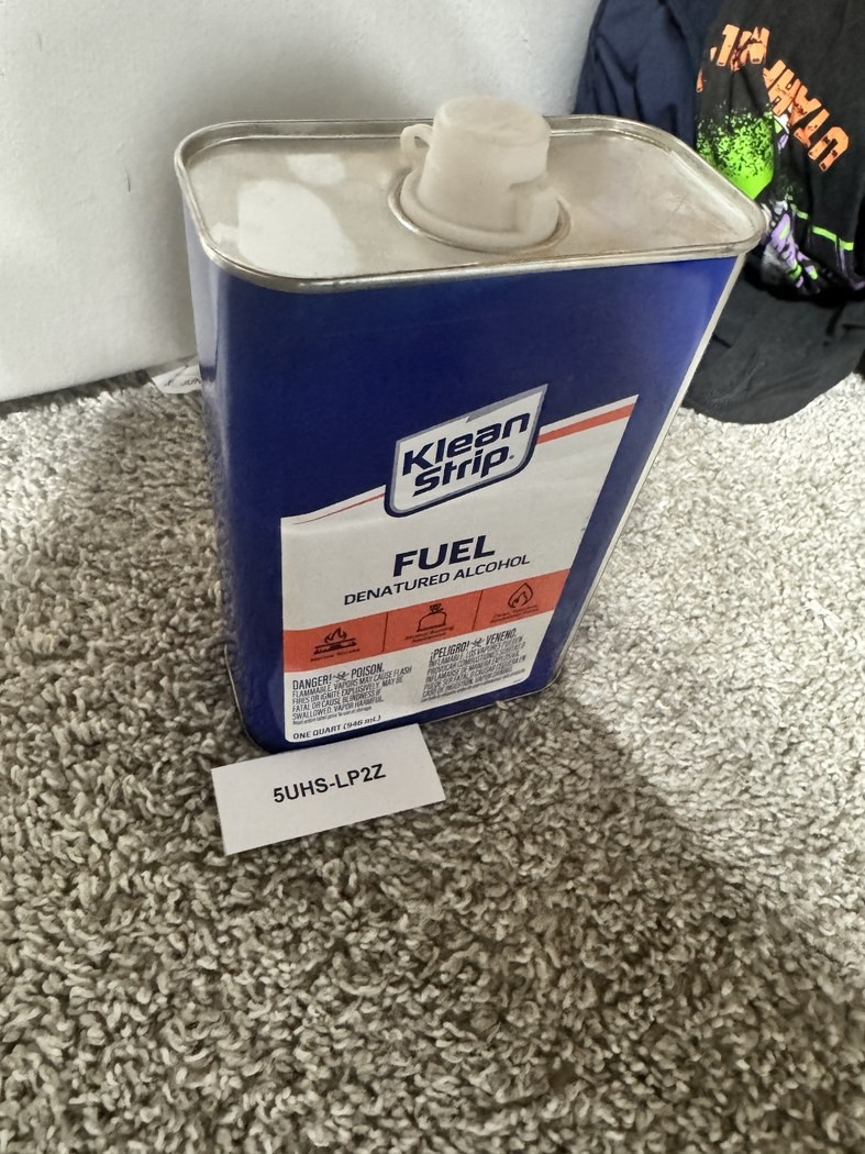 The hidden target for identifier 5UHS-LP2Z: a fuel can.